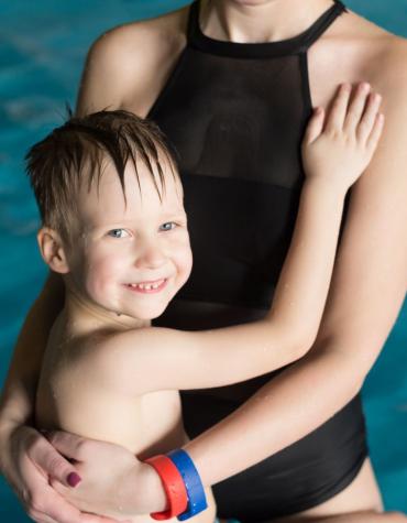 son and mom in pool
